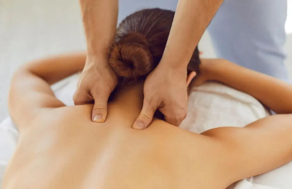 Massage Therapy – Relieve, Relax, and Recover licensed massage therapist helping patient relax and recover at chiropractic wellness center in Washington PA